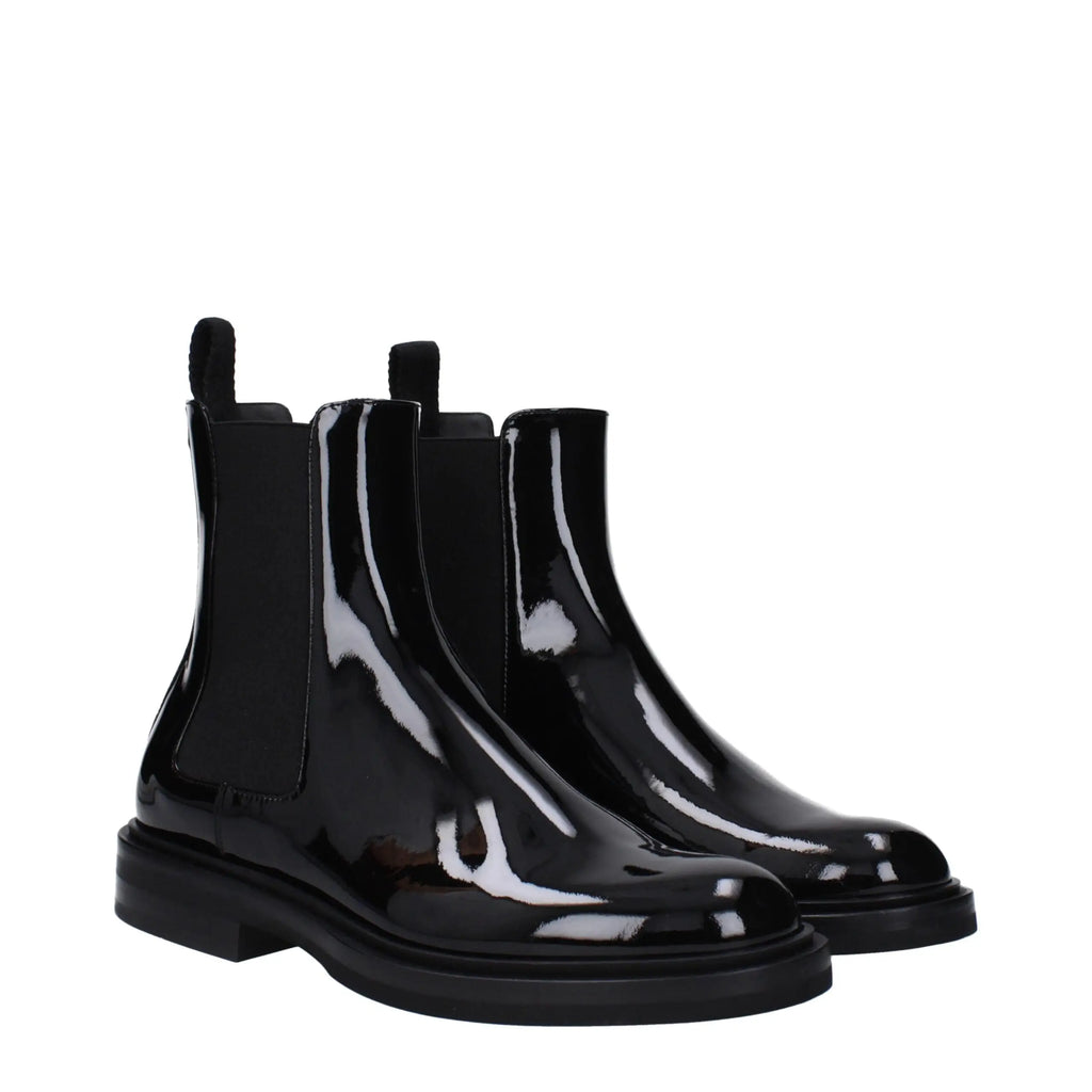 Dolce & gabbana bottines noires en cuir verni avec panneaux élastiques et semelle gomme épaisse