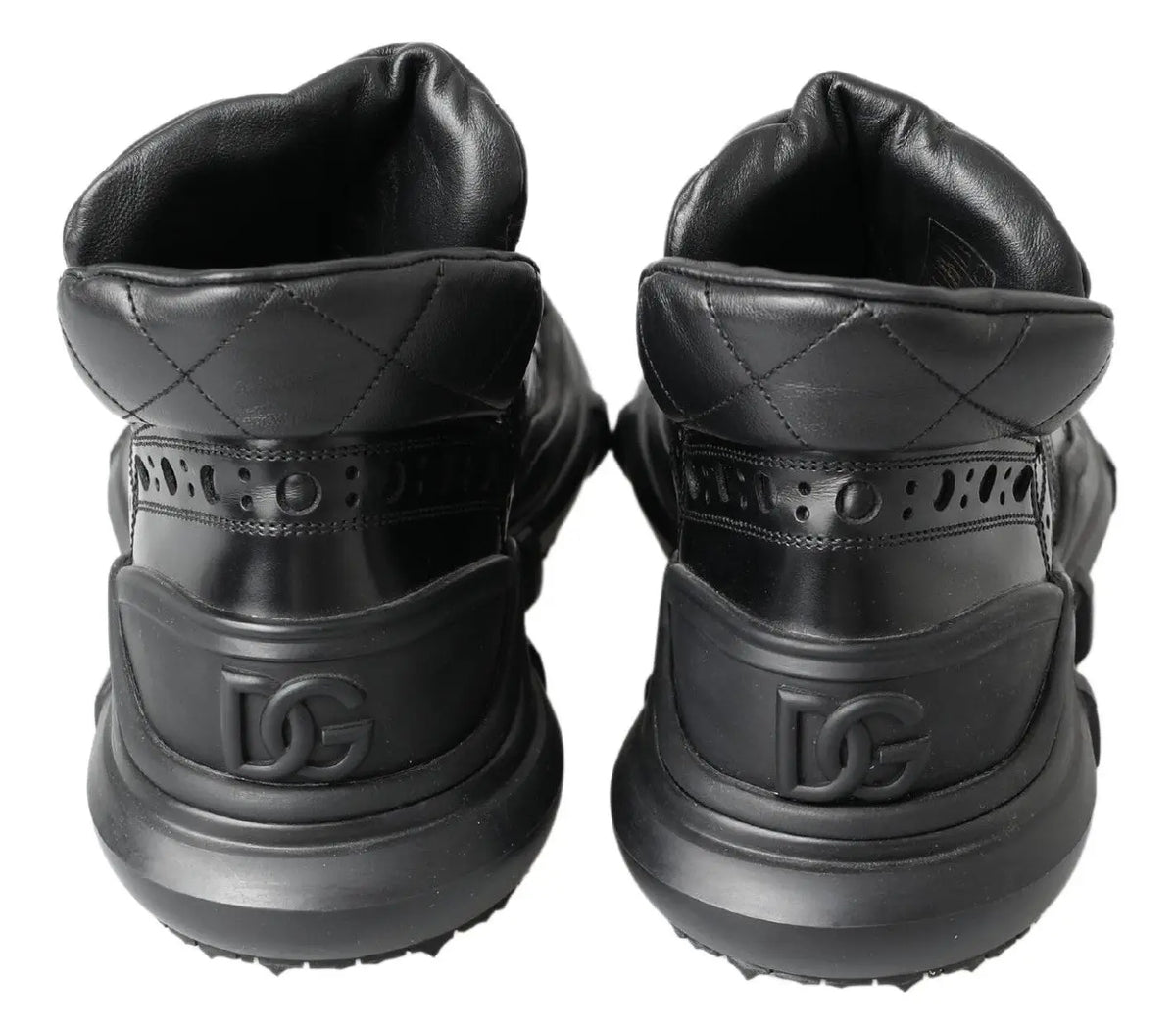 Bottes décontractées montantes dolce & gabbana en cuir noir avec détails matelassés et semelle épaisse en caoutchouc