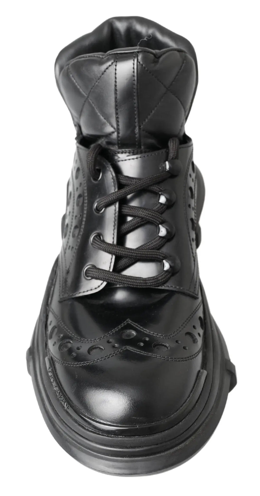 Bottines noires en cuir verni dolce & gabbana avec col matelassé et détails perforés style brogue