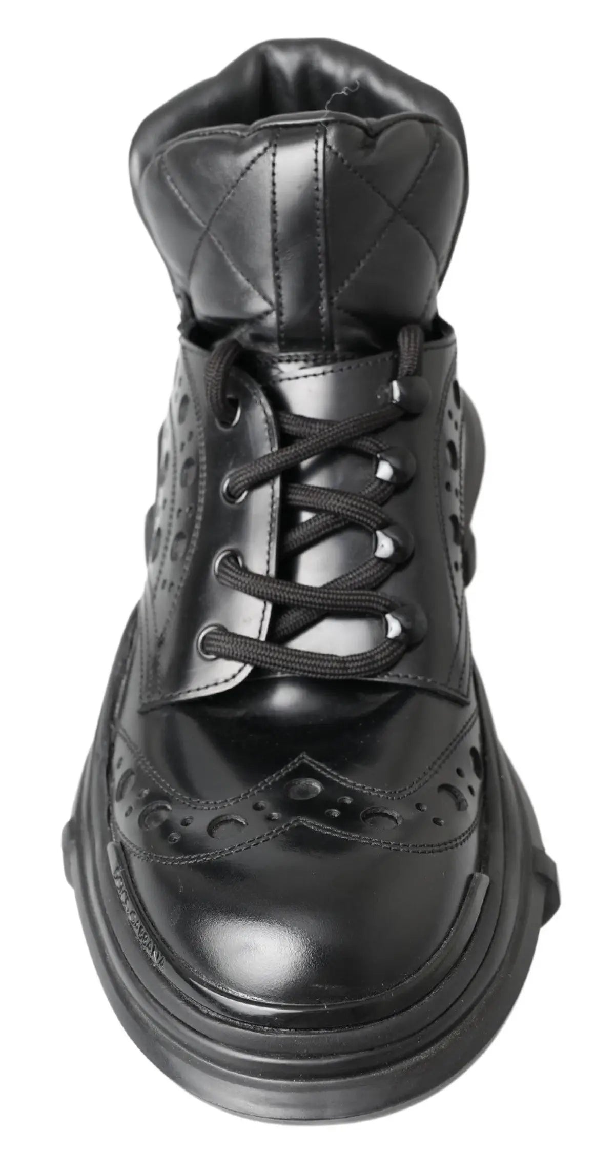 Bottines noires en cuir verni dolce & gabbana avec col matelassé et détails perforés style brogue