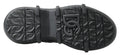 Semelle en caoutchouc noire avec logo dolce gabbana embossé et motif antidérapant pour bottines en cuir noir