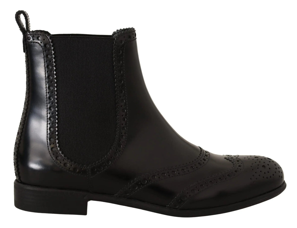 Dolce gabbana bottines plates hautes en cuir noir avec boots chelsea en cuir verni noir et détails brogues