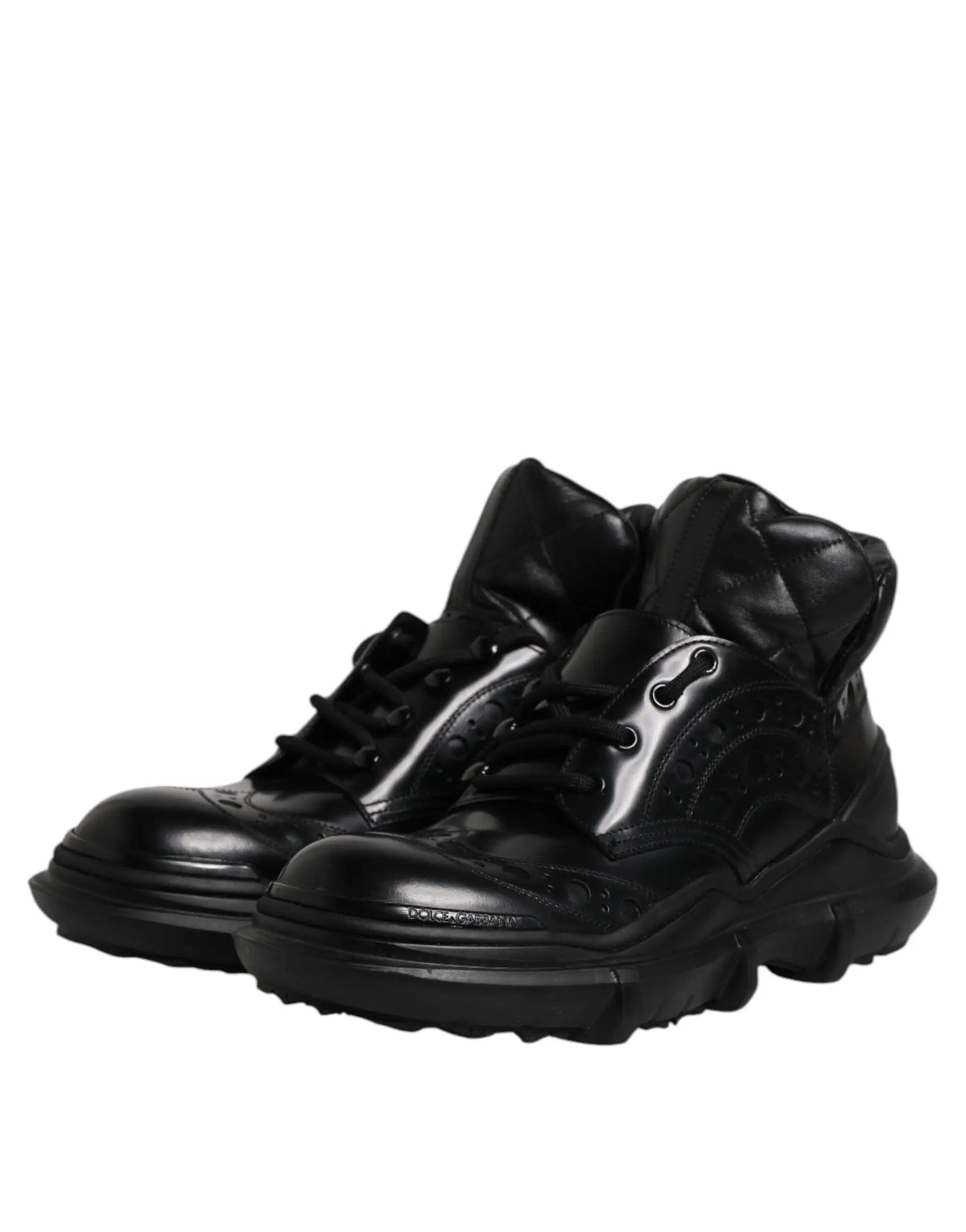 Dolce & gabbana bottines noires en cuir verni homme avec semelle épaisse en caoutchouc et détails embossés