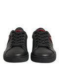 Dolce and gabbana sneakers basses en cuir noir avec accents rouges pailletés sur les côtés et la languette