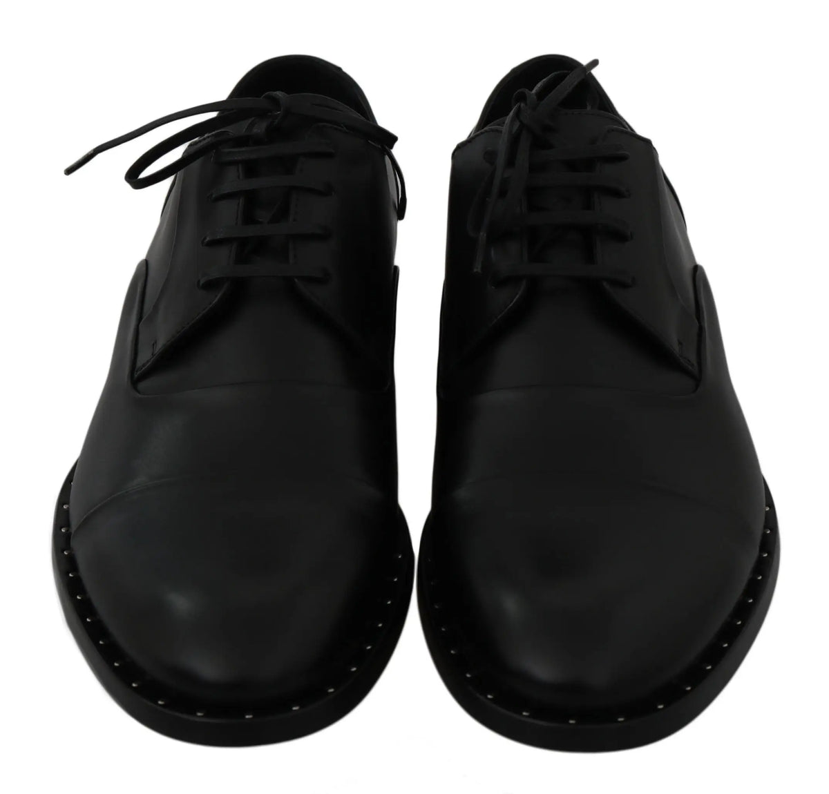 Dolce & gabbana chaussures derby en cuir noir avec surpiqûres blanches distinctives et finition brillante