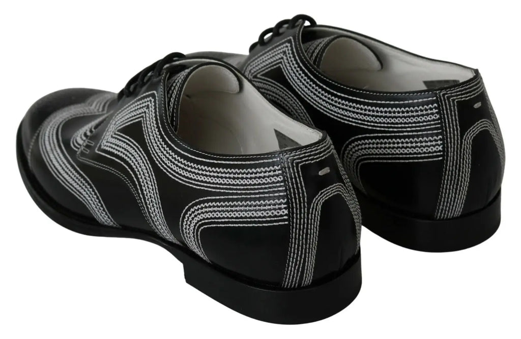 Dolce & gabbana derby formelles en cuir noir avec motifs géométriques blancs détaillés