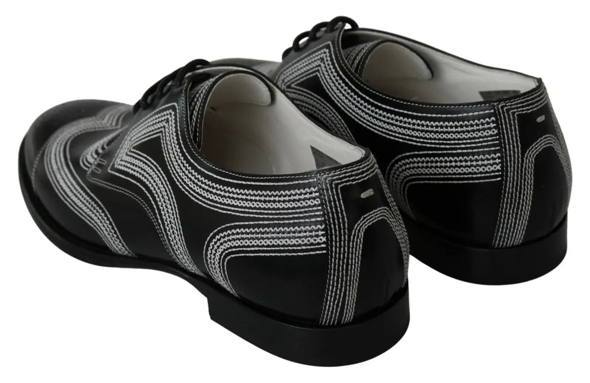 Dolce & gabbana derby formelles en cuir noir avec motifs géométriques blancs détaillés