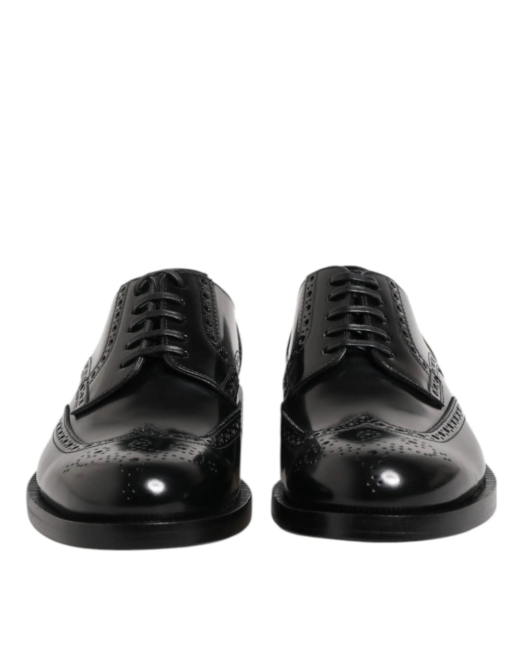 Dolce & gabbana chaussures derby en cuir noir avec finitions en cuir verni et détails perforés décoratifs