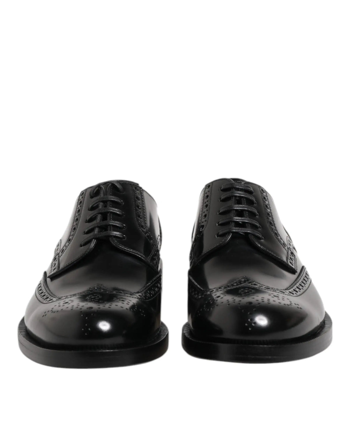 Dolce & gabbana chaussures derby en cuir noir avec finitions en cuir verni et détails perforés décoratifs