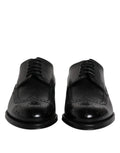 Dolce & gabbana chaussures derby noires en cuir avec finition polie et perforations décoratives formelles en brogue