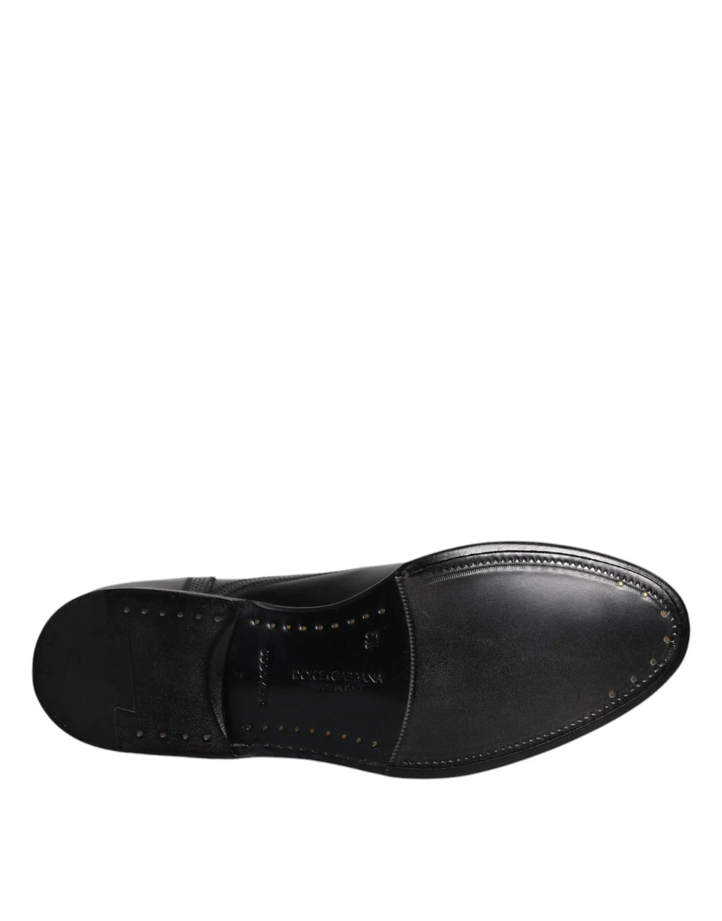 Dolce & gabbana chaussures derby wingtip formelles en cuir noir avec finition polie et coutures discrètes