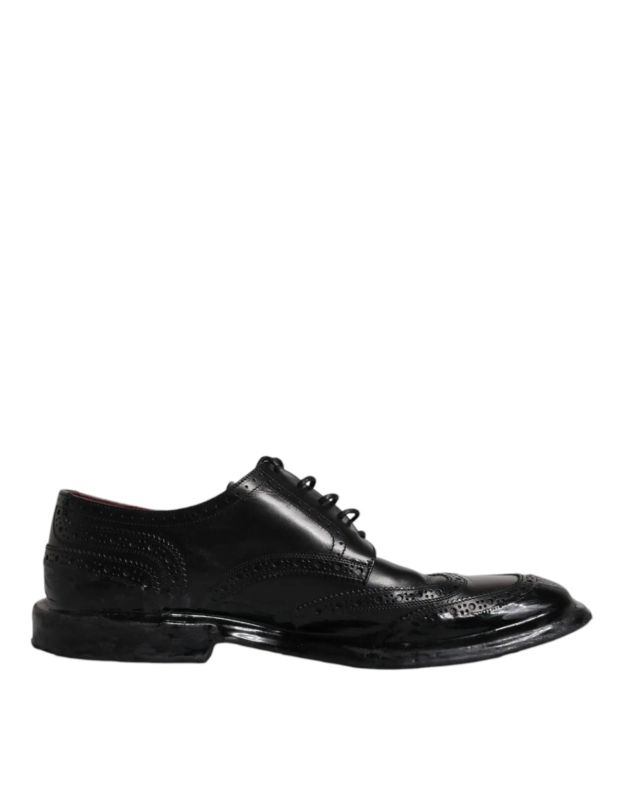 Dolce & gabbana derby wingtip formelles noires en cuir avec finition polie et perforations détaillées