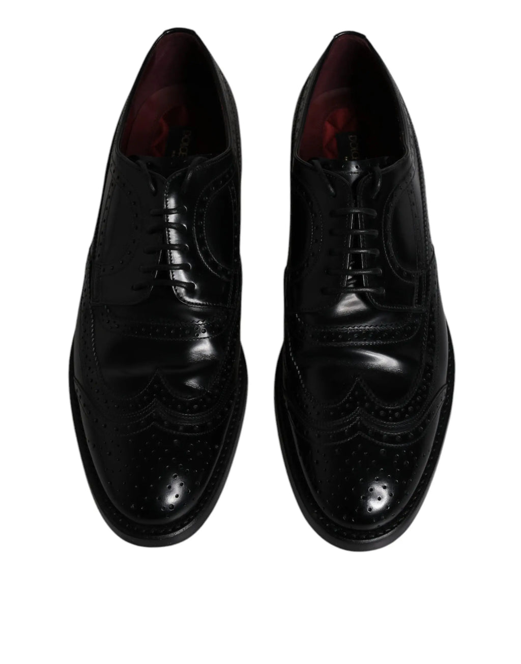 Dolce & gabbana chaussures derby brogue noires en cuir avec finition polie et découpe perforée pour usage formel