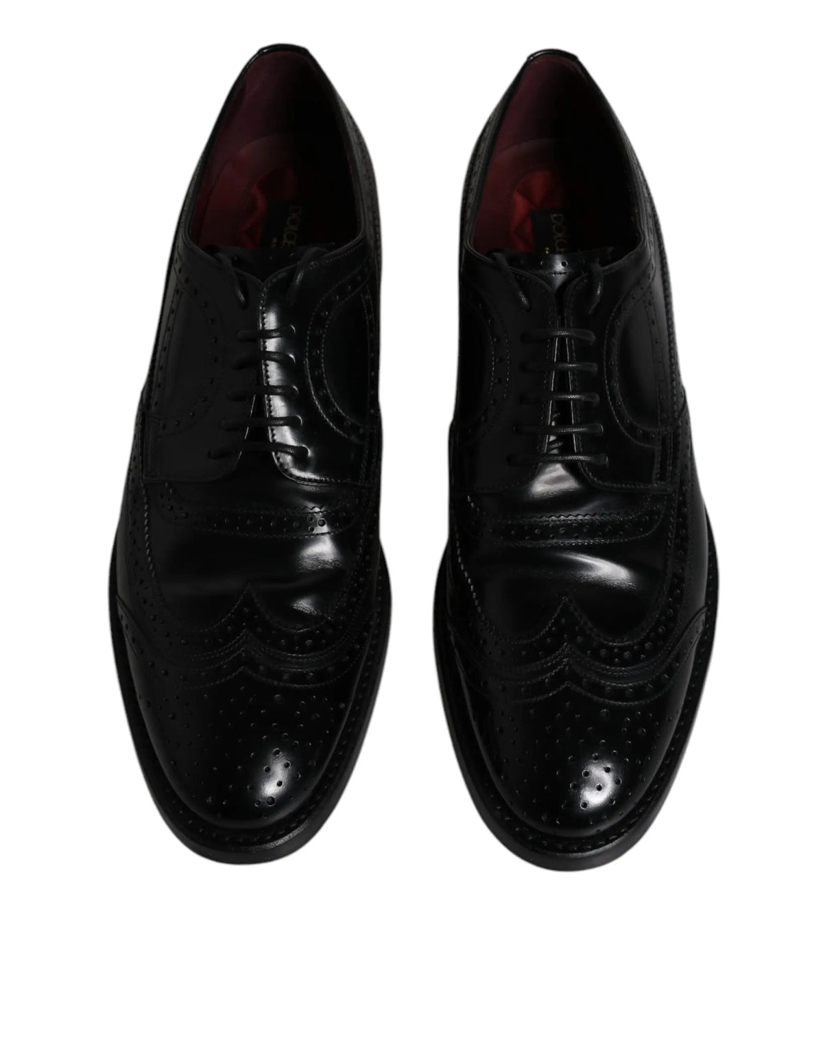 Dolce & gabbana chaussures derby brogue noires en cuir avec finition polie et découpe perforée pour usage formel