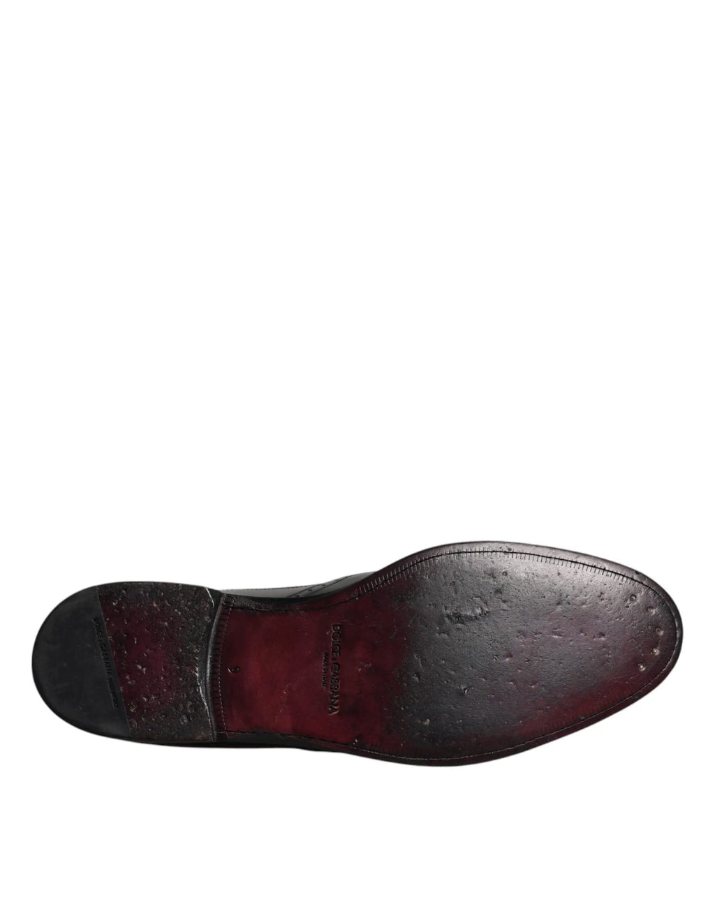 Semelle en cuir noir brun foncé avec gradient rouge profond et coutures embossées de chaussures formelles derby wingtip dolce gabbana