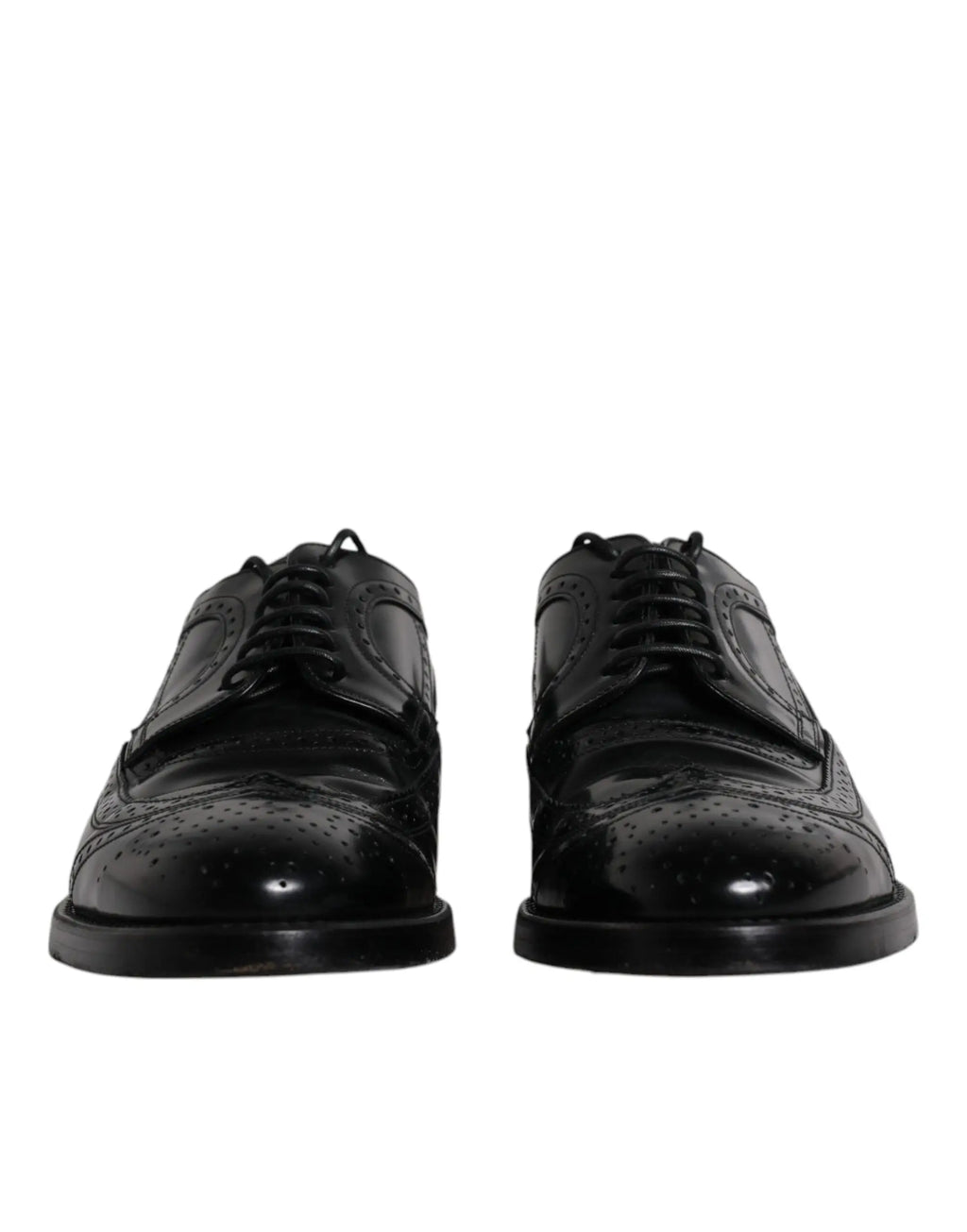 Dolce & gabbana chaussures derby noires en cuir avec finition brillante et détails perforés style brogue formel