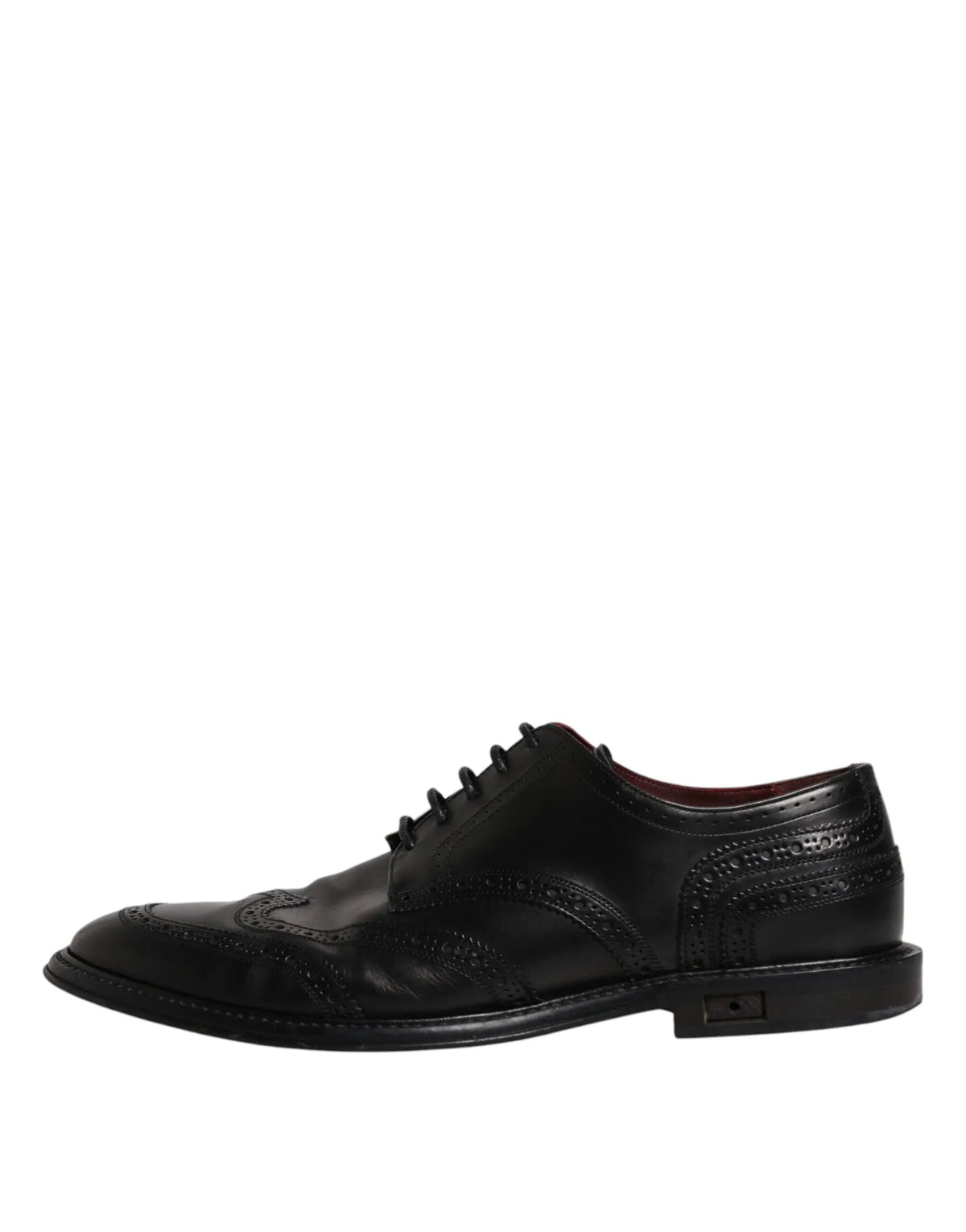Dolce & Gabbana derby wingtip noir en cuir avec motifs perforés et finition brillante pour tenue formelle