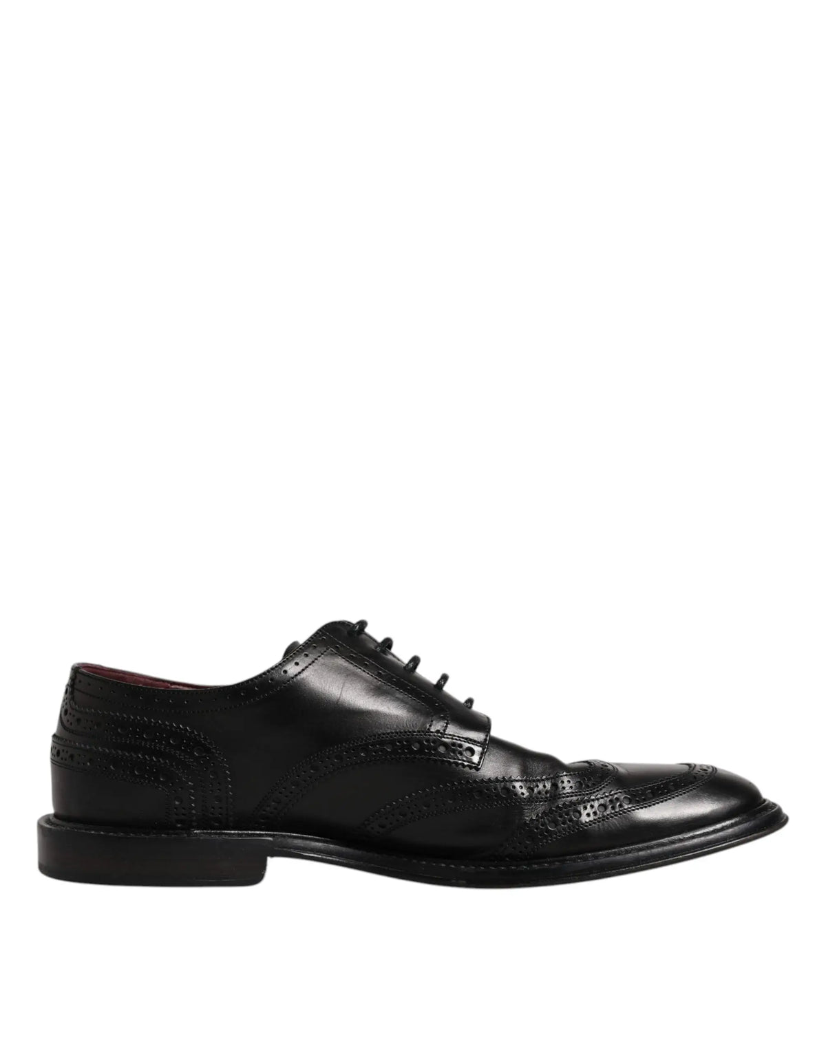 Dolce & gabbana derby wingtip chaussures noires en cuir avec finitions vernies et motifs perforés élégants