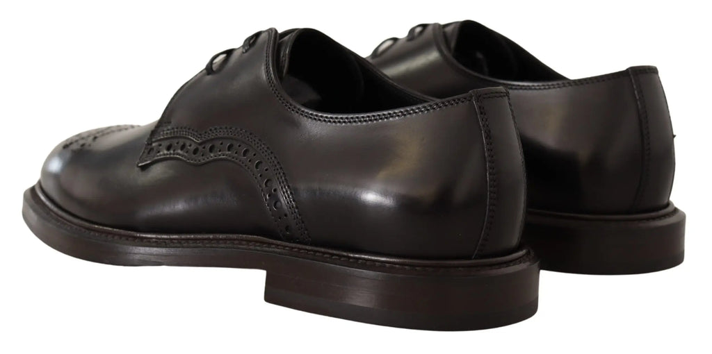Dolce & gabbana chaussures derby formelles en cuir noir avec finition polie et perforations décoratives