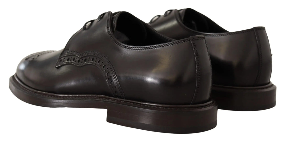 Dolce & gabbana chaussures derby formelles en cuir noir avec finition polie et perforations décoratives