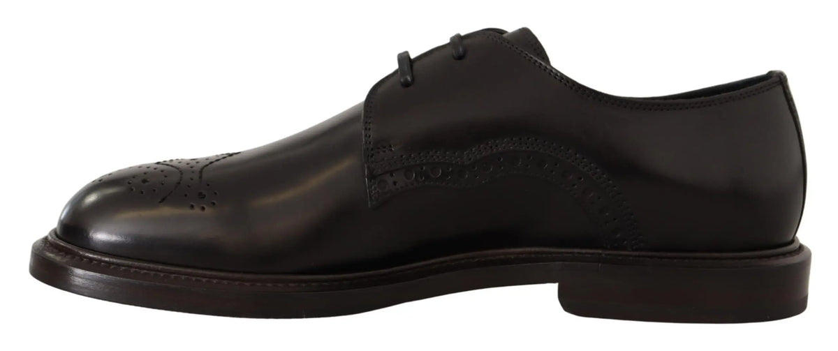 Dolce & gabbana derby noir en cuir avec perforations élégantes et finition polie pour tenue formelle