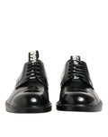 Dolce & gabbana chaussures derby noires en cuir verni avec logo gab blanc sur la languette pour homme formelles