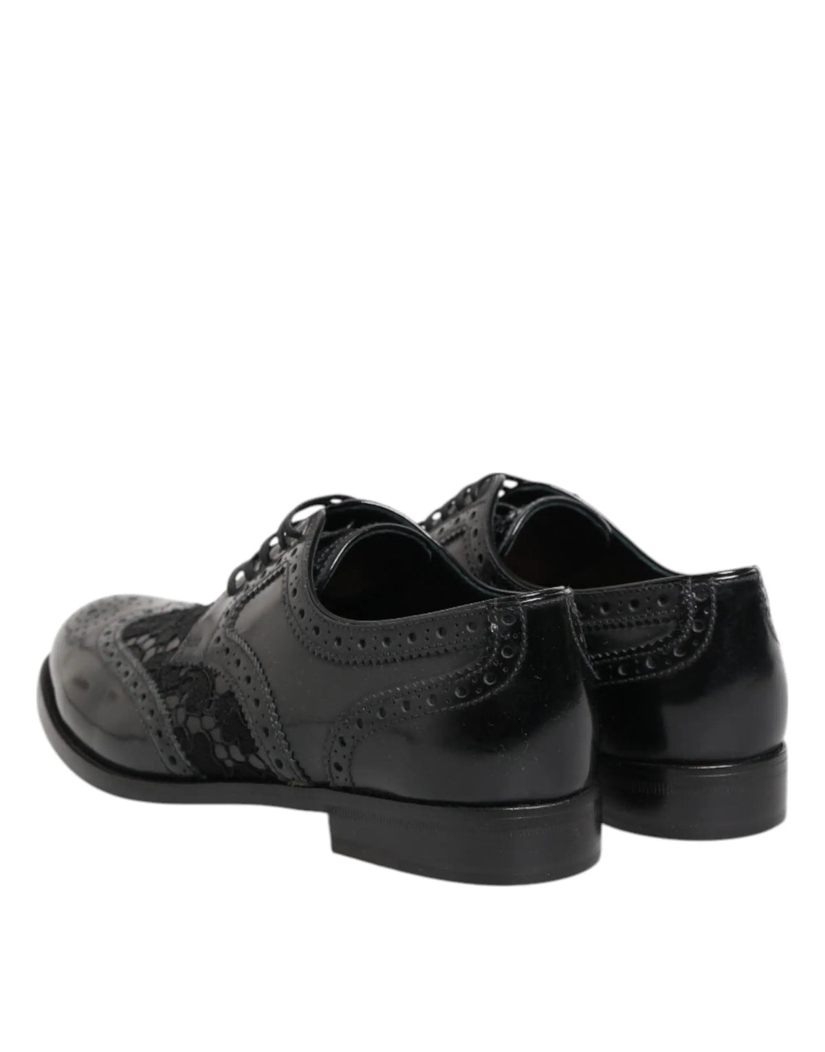 Dolce & gabbana chaussures habillées en cuir noir avec finitions florales en dentelle et détails perforés brillants