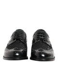Dolce & Gabbana chaussures habillées en cuir noir verni avec broderie florale et détails perforés style brogue