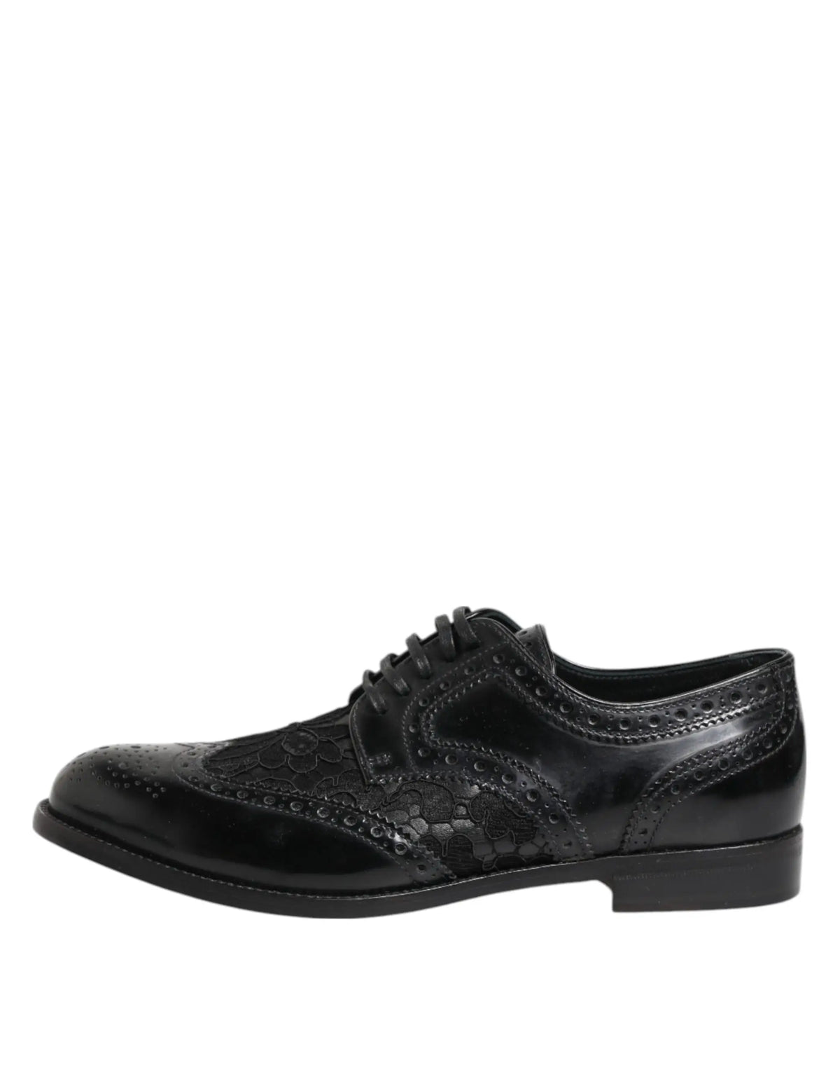 Chaussure formelle dolce & gabbana noire en cuir avec détails floraux perforés et finition polie style brogue oxford