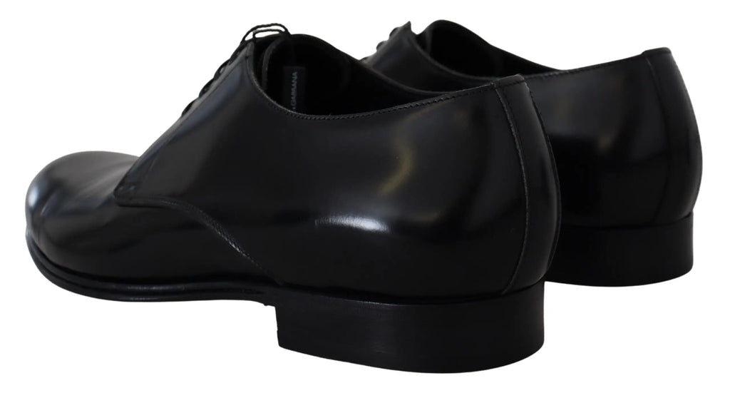 Dolce & gabbana chaussures habillées en cuir noir verni avec finition brillante et design à lacets classique
