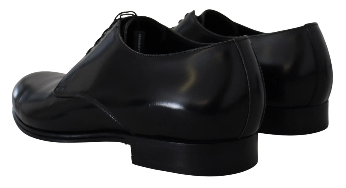 Dolce & gabbana chaussures habillées en cuir noir verni avec finition brillante et design à lacets classique