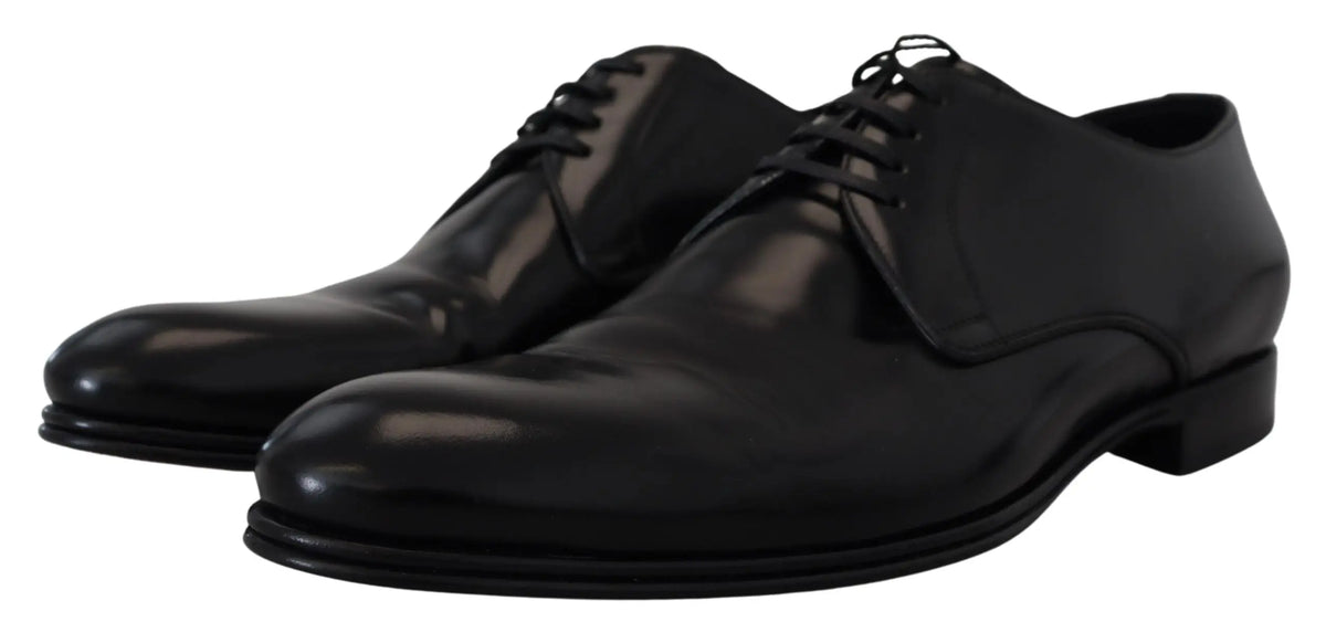 Dolce & gabbana chaussures habillées en cuir noir avec finition polie et design lacé classique