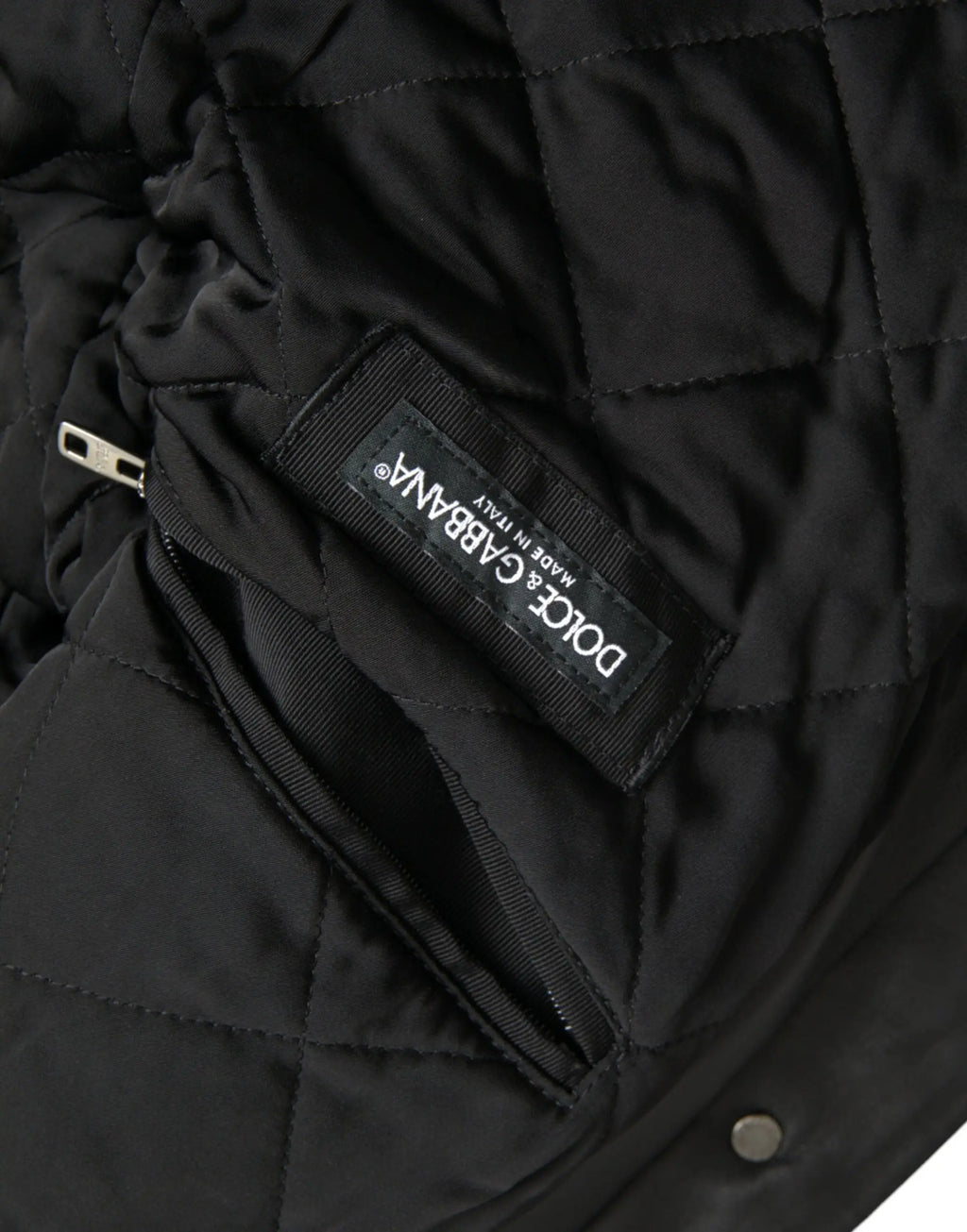 Veste biker noire dolce gabbana en cuir avec col en fourrure et matelassage noir avec étiquette dolce gabbana