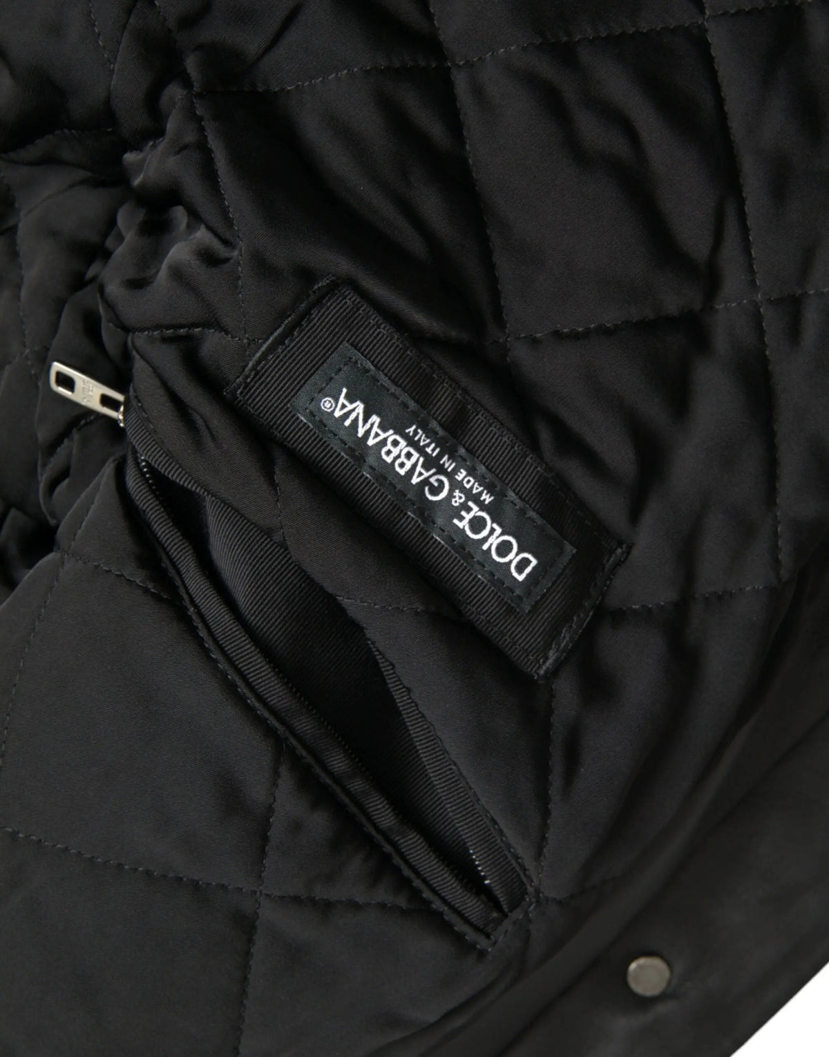 Veste biker noire dolce gabbana en cuir avec col en fourrure et matelassage noir avec étiquette dolce gabbana