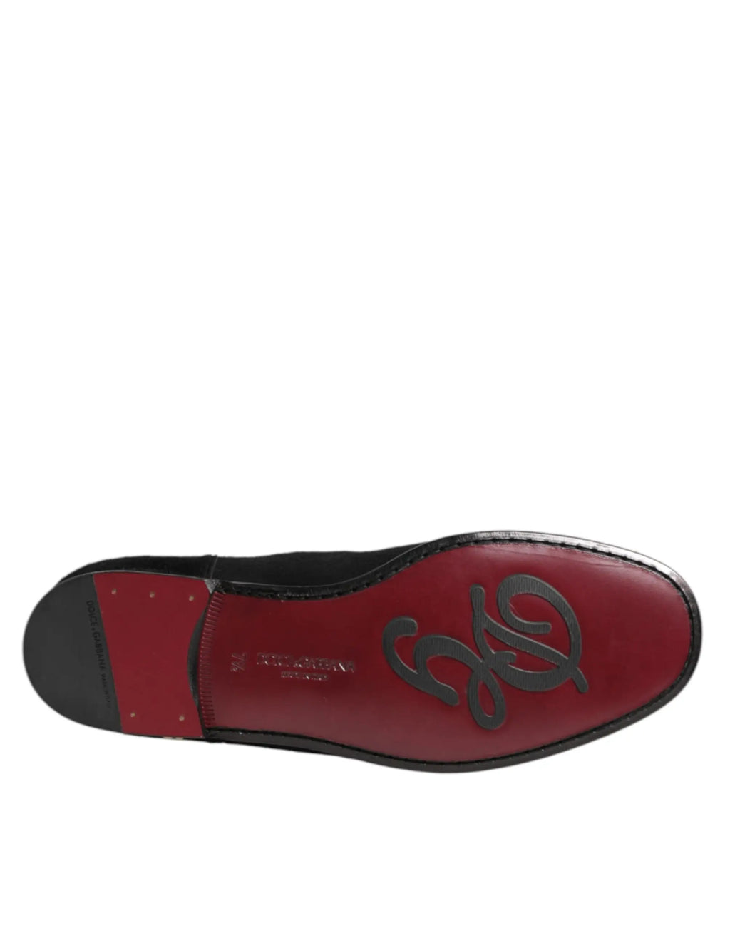 Chaussure rouge en cuir avec logo noir sur la semelle dans les bottes chelsea en cuir noir et fourrure pour homme dolce gabbana