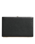 Dolce & gabbana black leather clutch with pebbled texture and gold-tone hardware for evening parties