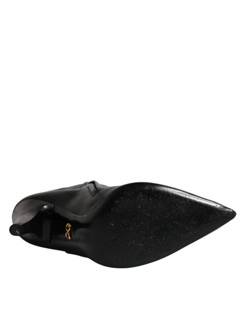 Bottes dolce & gabbana en cuir verni noir à bout pointu avec logo doré visible sur le talon, vue arrière