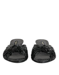 Dolce & Gabbana sandales slides en cuir noir à texture peau de serpent avec détail noué à l’avant