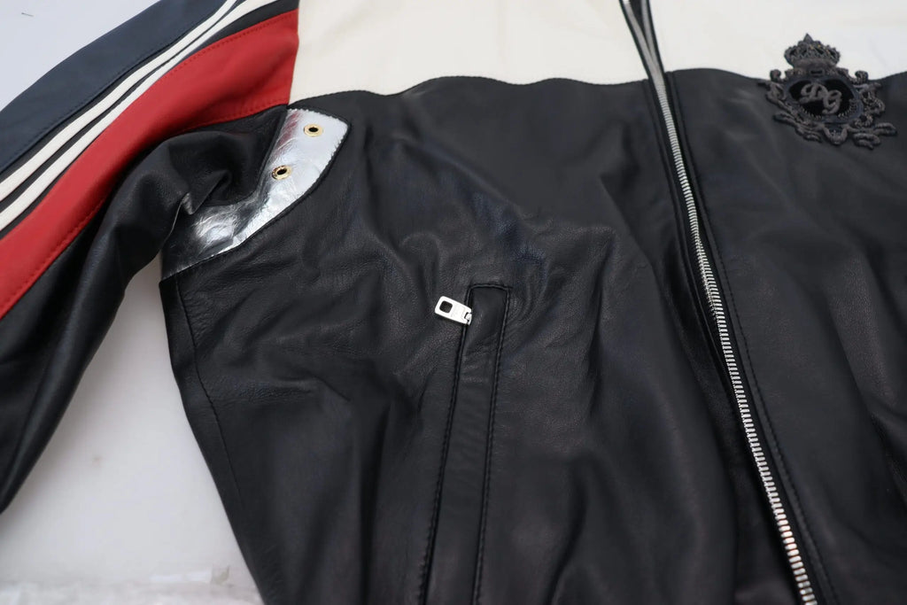 Dolce & gabbana veste blouson noir en cuir avec manches rayées rouge et blanc patch métallique et emblème au col