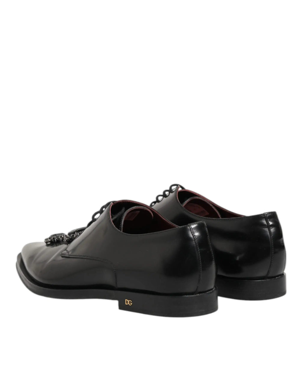 Chaussures derby dolce & gabbana en cuir noir verni avec gland décoratif et logo doré au talon