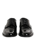 Derby noir en cuir verni de dolce & gabbana avec finition brillante et lacets classiques pour tenue formelle