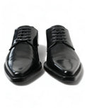 Dolce & gabbana chaussures derby en cuir noir verni à bout pointu et lacets formels plats