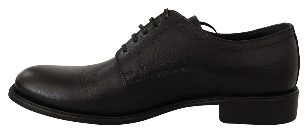 Chaussure derby homme dolce & gabbana en cuir noir avec lacets finition brillante et talon bas formel