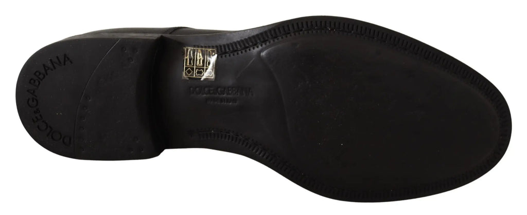 Semelle arrière de chaussure derby formelle homme en cuir noir dolce & gabbana avec logo embossé et étiquette dorée