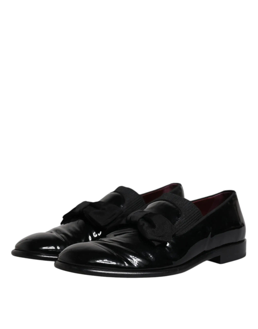 Dolce & gabbana mocassins noirs en cuir verni avec finition brillante et détails de nœud pour homme élégant