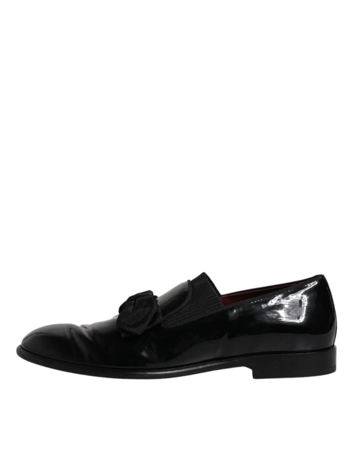 Dolce & gabbana mocassins noirs en cuir verni avec un fini brillant et un noeud décoratif pour homme élégant