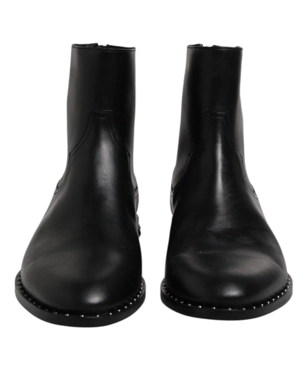 Bottes cheville en cuir noir dolce gabbana avec finition polie et clous argentés décoratifs le long de la semelle