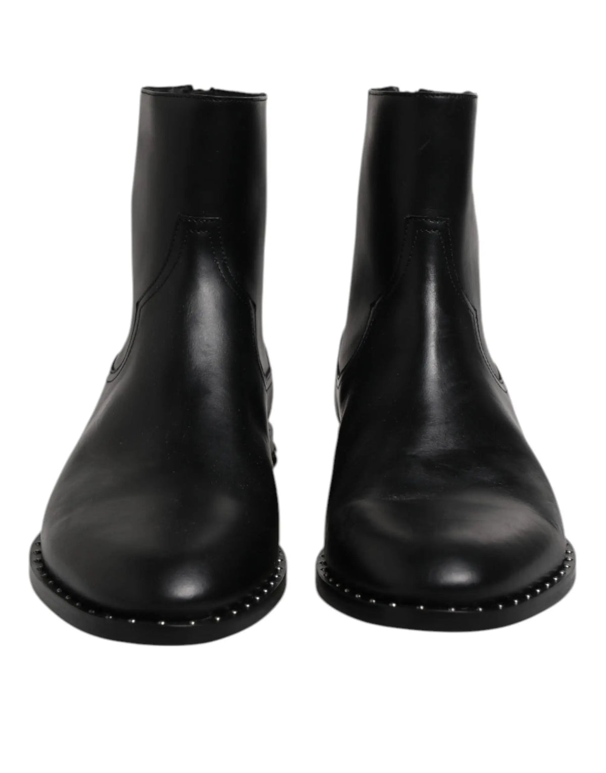 Bottes cheville en cuir noir dolce gabbana avec finition polie et clous argentés décoratifs le long de la semelle
