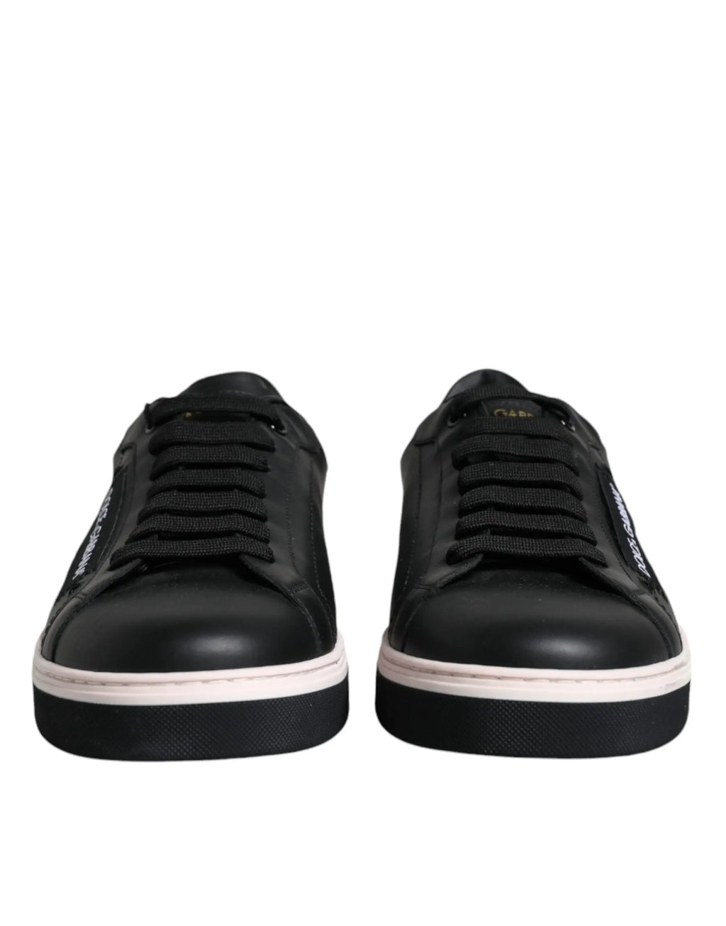 Dolce & gabbana baskets basses homme en cuir noir avec semelles en caoutchouc blanches et branding latéral subtil