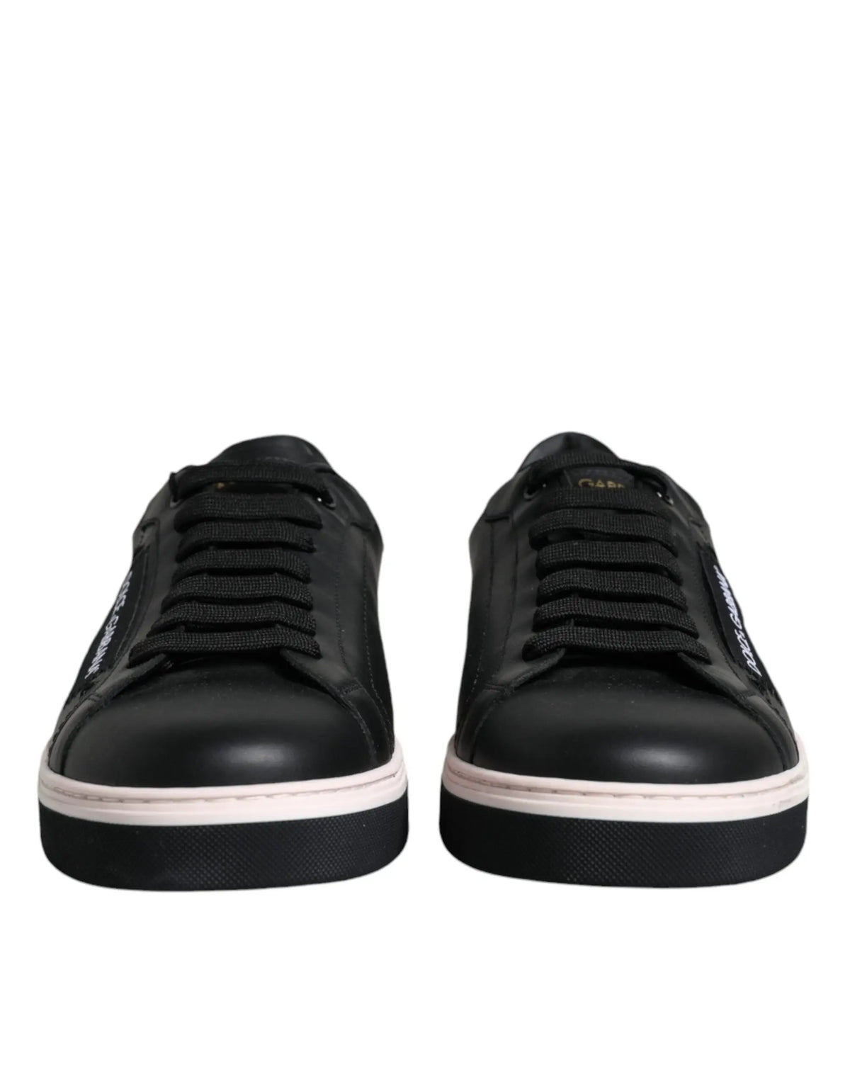 Dolce & gabbana baskets basses homme en cuir noir avec semelles en caoutchouc blanches et branding latéral subtil